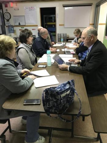 Clockwise from left, Kathy Tibbetts, Principal Lisa Clarke, Dave Benner, Adam Harkins, Jane Hulholland, Lisa Smith (partly hidden) and Superintendent Dr. Keith Laser at the school committee meeting. KELLIE BIGOS/Boothbay Register