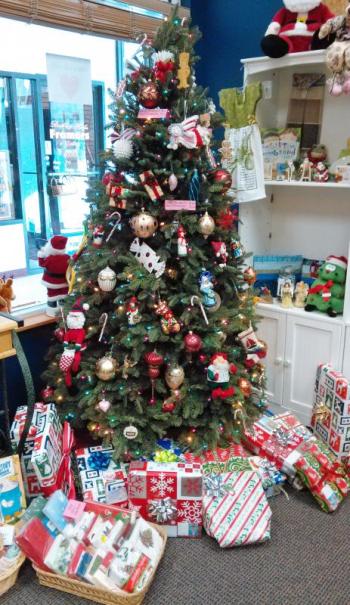 Wrapped presents are under the tree at the Community Center, courtesy of a generous donor and the Boothbay Harbor Police Department. JANE CARPENTER/Boothbay Register