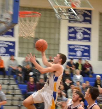 Seahawk co-captain Steve Reny soars for two of his eight points Dec. 20 in his team’s 63-34 win against Richmond. BILL PEARSON/Boothbay Register