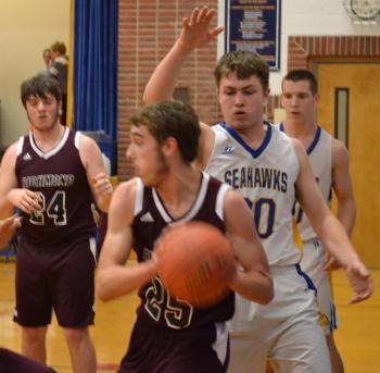 Seahawk co-captain Nicholas Morley shuts down a Richmond opponent in the low post. BILL PEARSON/Boothbay Register