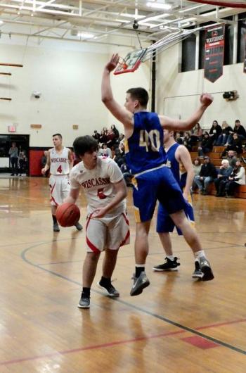 Billy Pinkham with the ball is defended by Boothbay’s Hunter Crocker. PHIL DI VECE/Wiscasset Newspaper