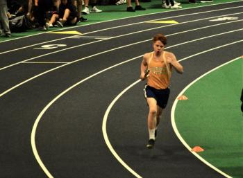 Mason Erhard powers through his leg of the 4 x 800 meter relay which the Seahawks won and set a new school record. Courtesy of Kerrin Erhard