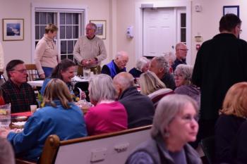 People enjoy the pasta dinner at the Congregational Church on Saturday, Jan. 19, a fundraiser for local Coast Guard families. Bob Crink photo