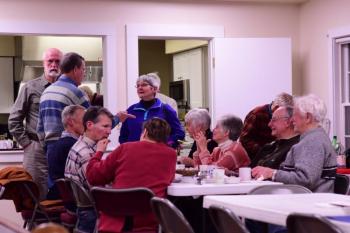 People enjoy the pasta dinner at the Congregational Church on Saturday, Jan. 19, a fundraiser for local Coast Guard families. Bob Crink photo