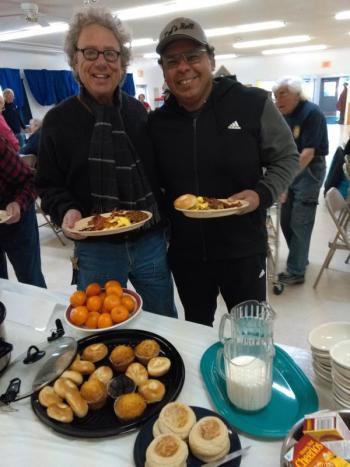 Veteran Barry Sherman, left, and Joe Moreira, famed Jiu-Jitsu practitioner, enjoy the breakfast. JANE CARPENTER/Boothbay Register