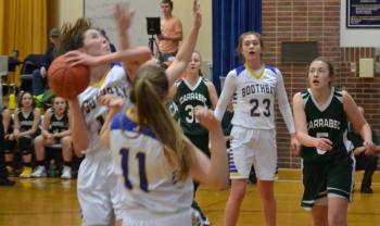 Seahawk forward Glory Blethen fights for an offensive rebound Jan. 4 in her team’s 62-19 victory over Mountain Valley Conference foe Carrabec at Porter Memorial Gymnasium. BILL PEARSON/Boothbay Register
