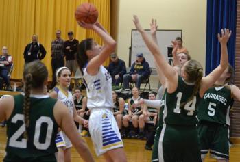 Boothbay forward Glory Blethen scores two of her game high 16 points in the Lady Seahawks' 62-19 win over Carrabec. BILL PEARSON/Boothbay Register