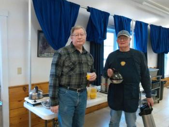 Jeff Keyes, left, and Miles Barter help keep the coffee coming. JANE CARPENTER/Boothbay Register