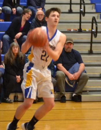 Boothbay senior Brett Hollowell scored two of his 14 points on the opening tip during his final home game Feb. 6 in the Seahawks’ 101-36 victory over Telstar. BILL PEARSON/Boothbay Register