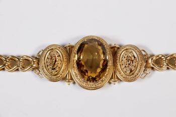 This 19th century Etruscan Revival gold bracelet with large citrine center stone is sure to capture someone’s attention. Courtesy of Carol Achterhof
