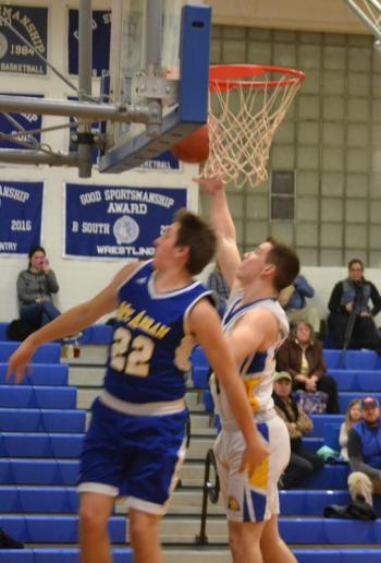 Boothbay forward Hunter Crocker seeks a rebound Jan. 31 in his team’s 81-55 victory over Mount Abram at Porter Gymnasium. BILL PEARSON/Boothbay Register
