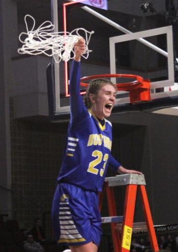 Faith Blethen swings the net following Boothbay’s state championship victory. STEVE EDWARDS/Boothbay Register