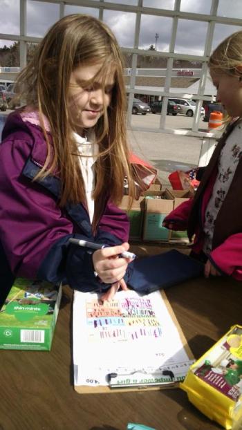 The troop’s recordkeeper, Abby, reported the best sellers were easily Caramel Delights and Thin Mints. MARGARET HOFFMAN/Boothbay Register