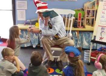 AOS 98 Superintendent Keith Laser shares a moment with a student before reading to Jessica Lessner’s kindergarten class. JANE CARPENTER/Boothbay Register