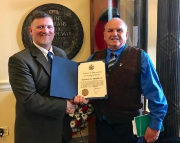 MBVS Director David Richmond presents a certificate to Ross Maddocks in celebration of National Vietnam War Veterans Day. Sarah Sherman photo