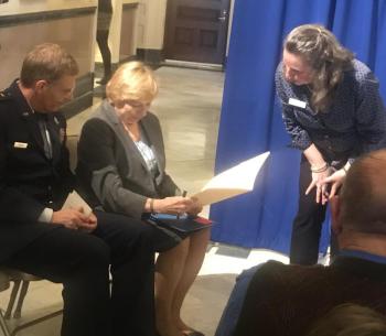 Governor Janet Mills, sitting next to Maj. General Douglas Farnham, Adjutant General for the State of Maine, and Sarah Sherman at the Vietnam Veterans Day ceremony. Jim Singer photo