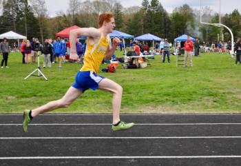 Blake Erhard crushes the 400m dash, earning second place. Courtesy of Kerrin Erhard