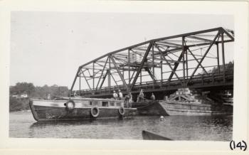 The swingbridge span being floated into place. Courtesy of MDOT historic bridge archives