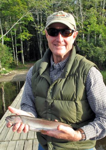 Steve Rubicam shows off a locally-caught stocked rainbow trout. Courtesy of Christine Rubicam.