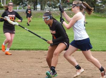 Boothbay defender Hannah Cola contains a Winslow attacker May 29 in a match in Boothbay Harbor. BILL PEARSON/Boothbay Register
