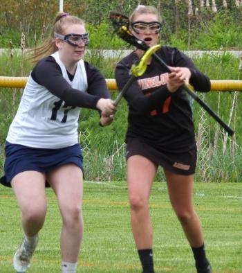 Boothbay defender Kylie Brown watches a Winslow attacker May 29 during a Class C match in Boothbay Harbor. BILL PEARSON/Boothbay Register