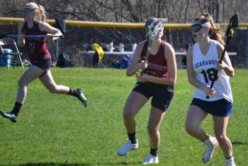 Boothbay’s Hali Goodwin advances the ball into Freeport territory May 6 in the Lady Seahawks’ 19-9 loss at Sherman Field. BILL PEARSON/Boothbay Register