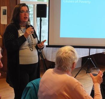 Executive Director Katie Spencer White welcomes returning Boothbay Region Community Resource Council volunteers and board members on June 13 by reminding them about the challenges facing low income families on the peninsula. BILLPEARSON/Boothbay Register