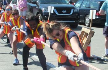 The Working Gals tug for all they're worth against Clear Stream Construction. LISA KRISTOFF/Boothbay Register