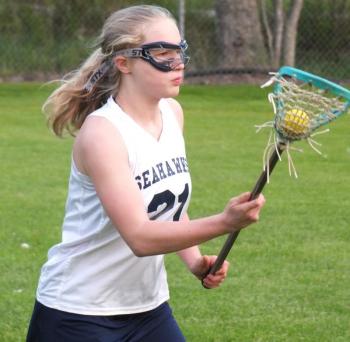 Boothbay freshman Journey Bennett looks for an open cutter May 31 in her team’s 9-4 victory over the combined Hall-Dale/Gardiner team in schoolgirl lacrosse action. BILL PEARSON/Boothbay Register