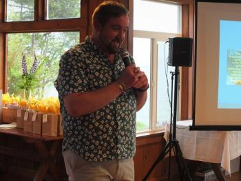 At Boothbay Region Community Resources Council's Welcome Home celebration held for returning volunteers and board members at Linekin Bay Resort on June 13, BRCRC vice chairman Michael Maxim thanks those who provided support for local families in need. BILL PEARSON/Boothbay Register