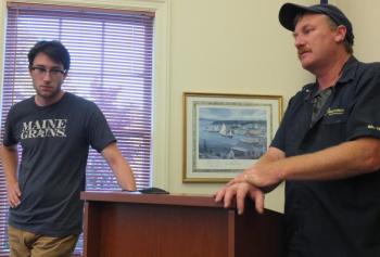 Boothbay Region Television station manager Cody Mitchell, left, and his father, local businessman Win Mitchell, encourage selectmen to renegotiate the town’s cable franchise agreement with Spectrum following new legislation which improves municipalities’ bargaining position. BILL PEARSON/Boothbay Register