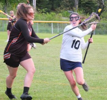 Boothbay senior Reagan Cola had three goals May 31 against the combined Hall-Dale/Gardiner team in schoolgirl lacrosse action. Boothbay won, 9-4, and finished sixth in the Class C Heal point standings. BILL PEARSON/Boothbay Register