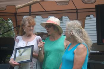 Nancy Cote, left, receives the “Spirit of America” award from State Sen. Eloise Vitelli, center, and State Rep. Allison Hepler. ART MAYERS/Wiscasset Newspaper
