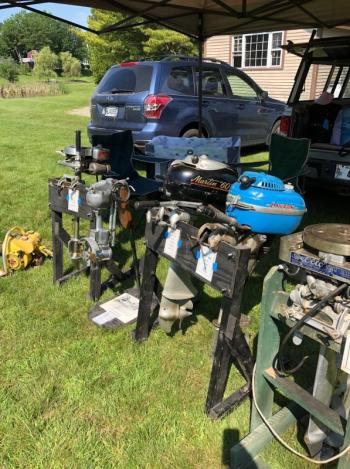 Pete Haskell of South Freeport brought a collection of outboard motors to the meetup of members of the Maine Antique Power Association at Boothbay Railway Village on Saturday. CRAIG LANCASTER/Boothbay Register Railway Village, engines, mechanics, Maine Antique Power Association