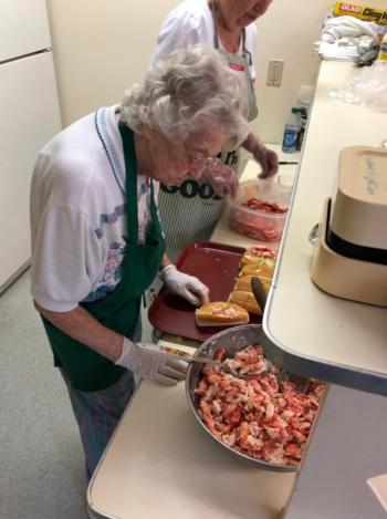 Betty Goulette prepares lobster roll filling for the Southport Country Fair lunch. CRAIG LANCASTER/Boothbay Register Southport, Southport Country Fair, Southport Town Hall, Southport United Methodist Church