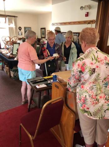 Fair attendees congregate at Southport United Methodist Church. CRAIG LANCASTER/Boothbay Register Southport, Southport Country Fair, Southport Town Hall, Southport United Methodist Church