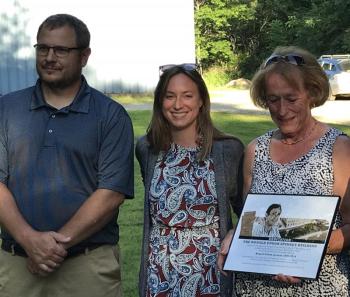 Son Jeffry and daughter Jennifer with their mother Nancy Spinney at the Dedication. Jeff was there with his wife Melissa, and Henry Brennan accompanied his wife Jennifer. Courtesy of Kate Steed