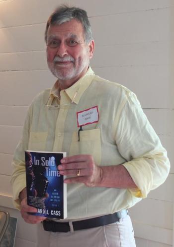 Richard Cass of Portland brought three of his books, “In Solo Time,” “Solo Act,” and “Last Call at Esposito’s” to the Books in Boothbay event at Boothbay Railway Village. BILL PEARSON/Boothbay Register
