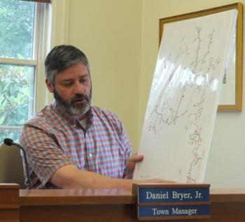 During the July 10 selectmen's meeting, Town Manager Dan Bryer presents a map showing municipal growth. BILL PEARSON/Boothbay Register