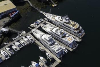 Superyachts dwarf their neighbors docked in the harbor. Courtesy YachtPics