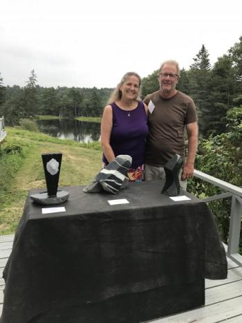 Sculptor Dan Ucci and his wife, Jill. Dan is the president of the Maine Stone Workers Guild and worked with Dick Alden to transport nearly all of the sculptures to Oak Point Farm. He was also a sculptor in the auction. Courtesy of BRLT