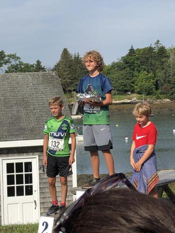 The winners of the Boys’ Race, ages 9-11, first place Colin Holt, second place Luke Crounse, and third place Alec Fairfield. JENNY BENNETT/Boothbay Register