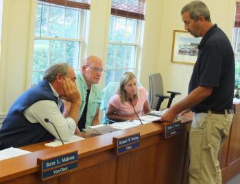 Code Enforcement Officer Jason Lorrain assists appeals board members during an application review on Aug. 26 regarding a home expansion request to add a deck to a Murray Hill Road property. BILL PEARSON/Boothbay Register