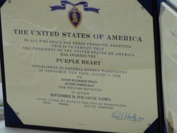 This document awards the Purple Heart to Justin P. Wiley, more than 100 years after his death. Ross Ragan photo