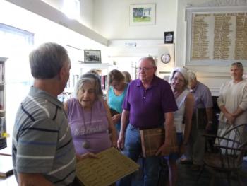 Guests patiently wait for book appraisals by Ken Gloss, far left, at Boothbay Harbor Memorial Library on Aug. 22. JANE CARPENTER/Boothbay Register