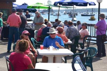 Attendees enjoy food and drinks during the event. Bob Crink photo