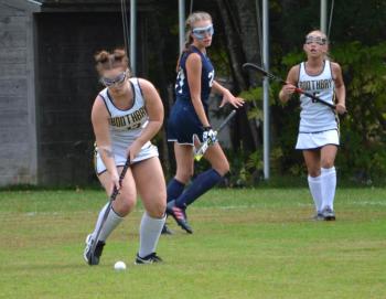 Senior tri-captain Josey Smith looks to pass to a teammate. KEVIN BURNHAM/Boothbay Register