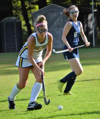 Seahawk junior Cortney Meader carries the ball to the offensive end of the field. KEVIN BURNHAM/Boothbay Register