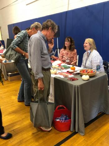 Sharing information at one of the LincolnHealth tables. JENNY BENNETT/Boothbay Register