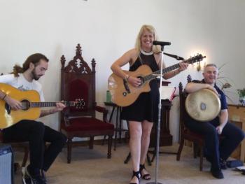 Singer-songwriter Kate McDonnell and her band perform for the guests at Edgecomb Days. JANE CARPENTER/Boothbay Register